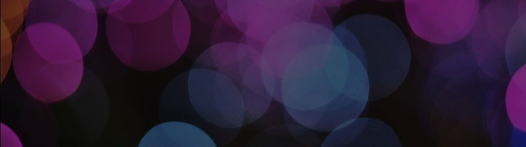 Dark background with purple, pink, and blue circles